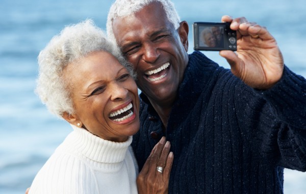 two senior citizens taking a selfie